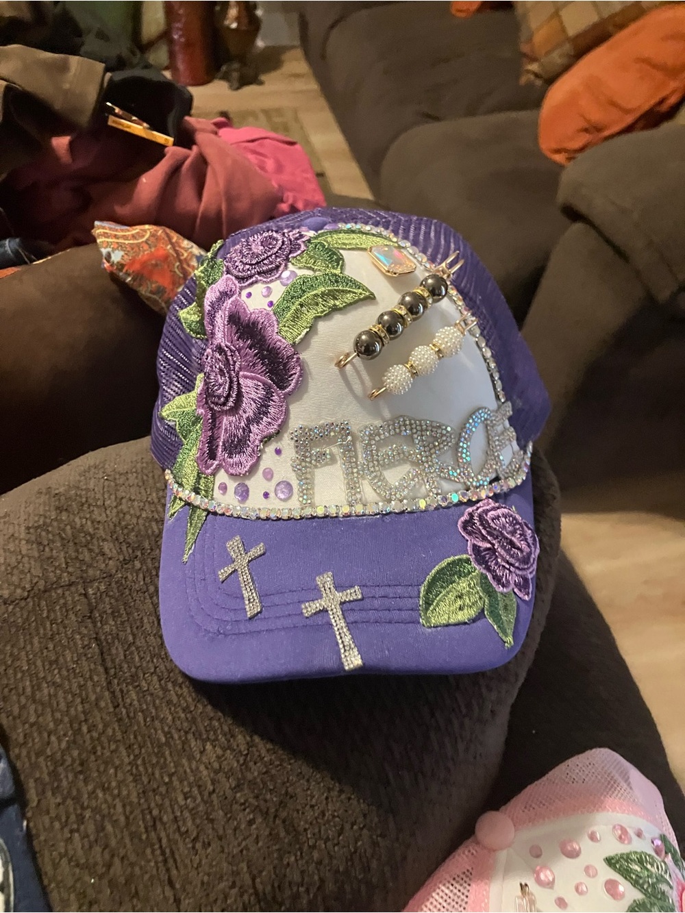 Hand Crafted Purple Embellished Cap with Floral Appliqué and Cross Accents